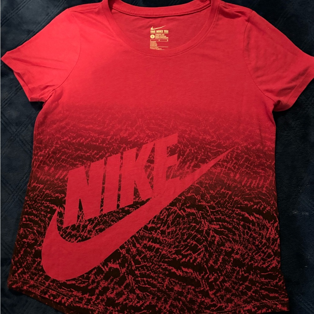 Girls size L NIKE pink and black short sleeved tee. “Nike” & swoosh on front